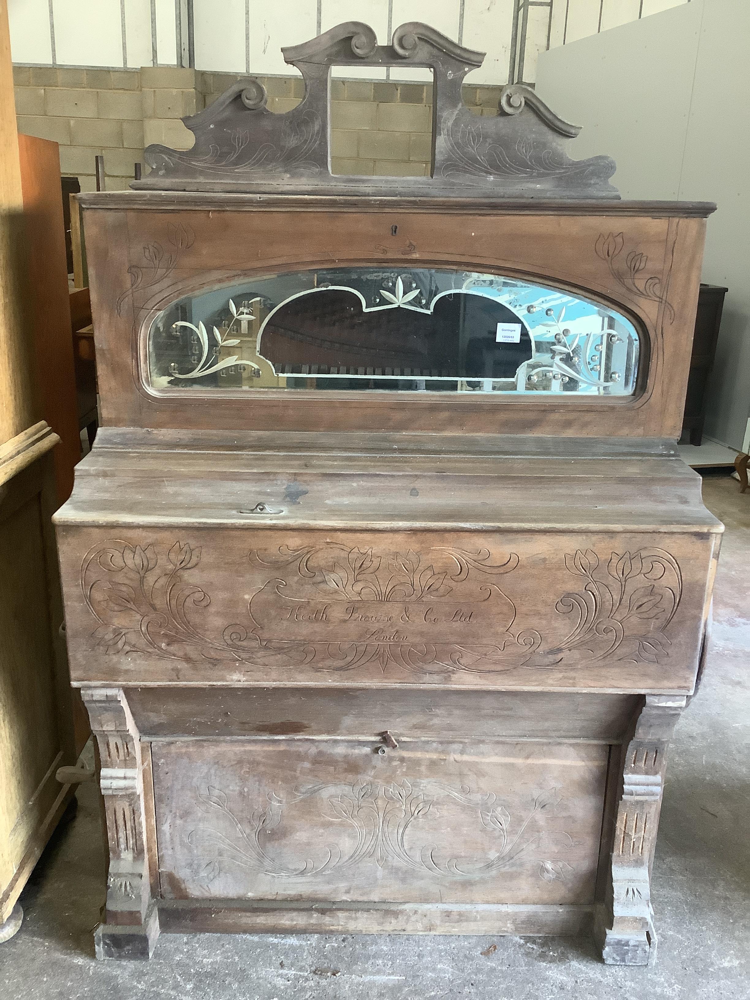 A late Victorian mahogany barrel organ with carved front panels, 'Keith Prowse & Co., Ltd., London, width 103cm, depth 62cm, height 160cm